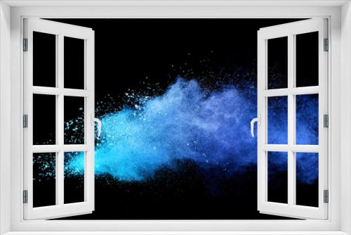 Fototapeta Naklejka Na Ścianę Okno 3D - Blue sky color powder explosion on black background.