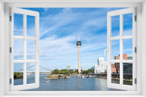 Fototapeta Naklejka Na Ścianę Okno 3D - panoramic view of the Medienhafen (Media Harbour) Düsseldorf with rhine in the foreground