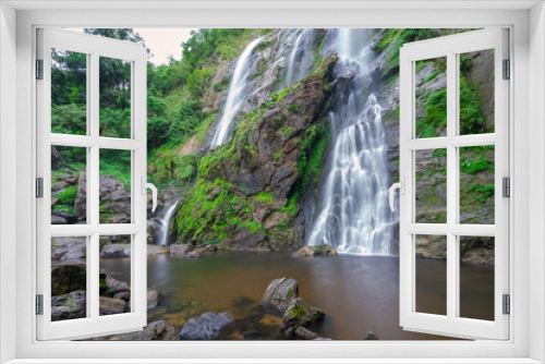 Fototapeta Naklejka Na Ścianę Okno 3D - Khlong Lan waterfall is a beautiful Waterfalls in the rain forest jungle Thailand