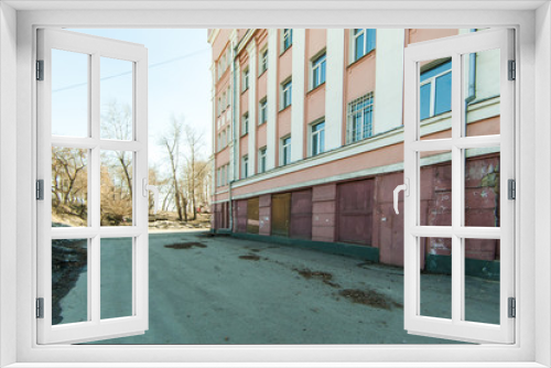 Fototapeta Naklejka Na Ścianę Okno 3D - Russia, Novosibirsk - June 15, 2019: Russian courtyards. buildings, house architecture, exterior. city ​​views