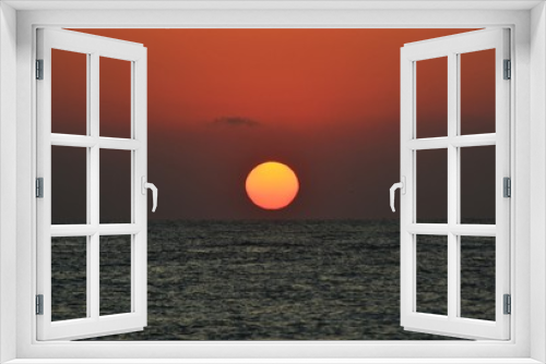 Fototapeta Naklejka Na Ścianę Okno 3D - a beautiful sunrise at the seashore