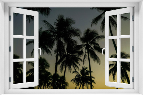 Fototapeta Naklejka Na Ścianę Okno 3D - Coconut palm trees against colorful sunset