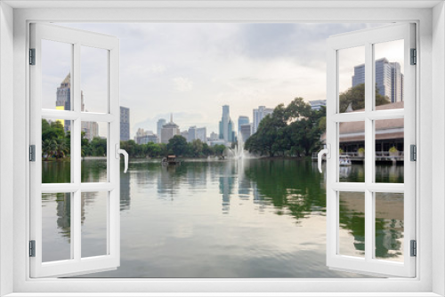 Fototapeta Naklejka Na Ścianę Okno 3D - Evening view of a park in Bangkok