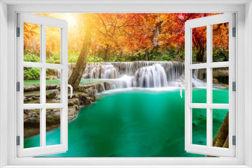 Fototapeta Naklejka Na Ścianę Okno 3D - Forest in autumn with river and waterfalls. There are beautiful rivers and waterfalls in the autumn forest. Wild Autumn with beautiful rivers and waterfalls.