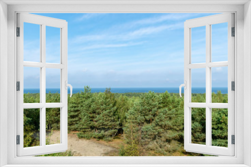 Fototapeta Naklejka Na Ścianę Okno 3D - view from the observation tower to the Curonian Spit, green forests and the sea coast in the distance