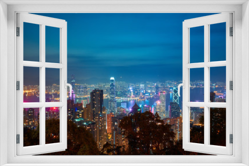 Fototapeta Naklejka Na Ścianę Okno 3D - Night city landscape. View from Victoria Peak to Victoria Harbor at night in Hong Kong.
