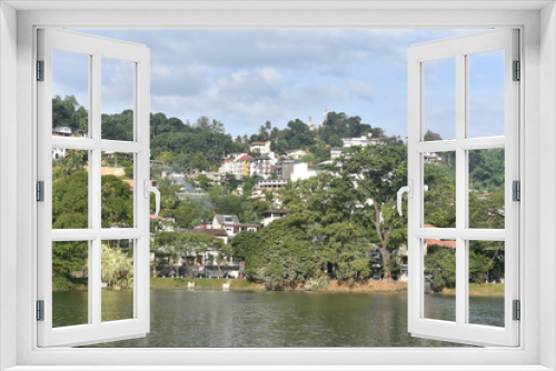 Fototapeta Naklejka Na Ścianę Okno 3D - Scenic view of Kandy city in Sri lanka.Kandy is surrounded by mountains.The city's heart is scenic Kandy Lake (Bogambara Lake) and Temple of the Tooth (Sri Dalada Maligawa)