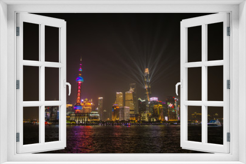 Fototapeta Naklejka Na Ścianę Okno 3D - A Beautiful night around the Bund area in Shanghai city , this viewpoint offers the best spot for watching the spectacular skyline of this massive city with the most famous shanghai tower.