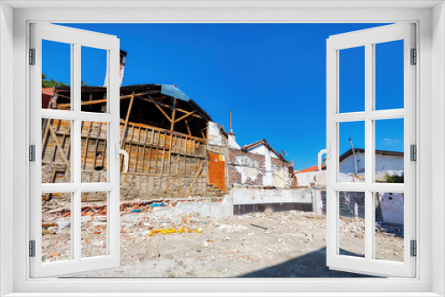 Fototapeta Naklejka Na Ścianę Okno 3D - Exterior view of old demolished intustrial buildings