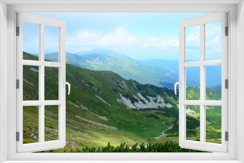 Fototapeta Naklejka Na Ścianę Okno 3D - View of mountains and rocks on a sunny summer day