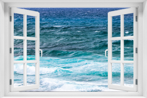 Fototapeta Naklejka Na Ścianę Okno 3D - Blue stormy shore water
