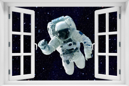 Fototapeta Naklejka Na Ścianę Okno 3D - Astronaut - Elements of this Image Furnished by NASA