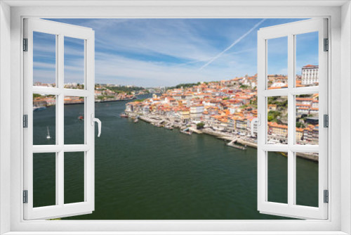 Fototapeta Naklejka Na Ścianę Okno 3D - Portugal, may 2019: Panorama from famous bridge Ponte dom Luis above Old town Porto and river Duoro at sunny summer day