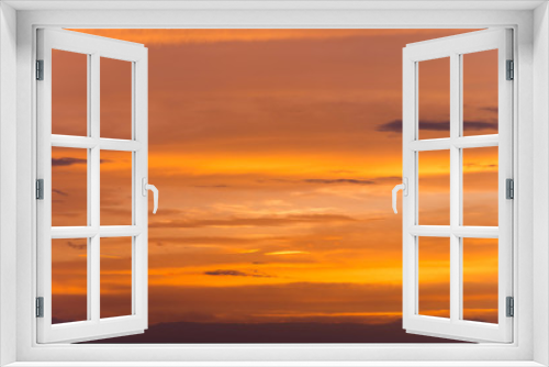 Fototapeta Naklejka Na Ścianę Okno 3D - Abstract nature background. Dramatic sunset sky in the clouds saturated with bright colors of orange and yellow. Contrast Low Key