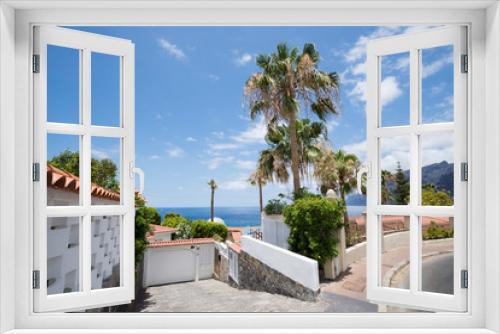 Fototapeta Naklejka Na Ścianę Okno 3D - Palmen in Gärten am Meer