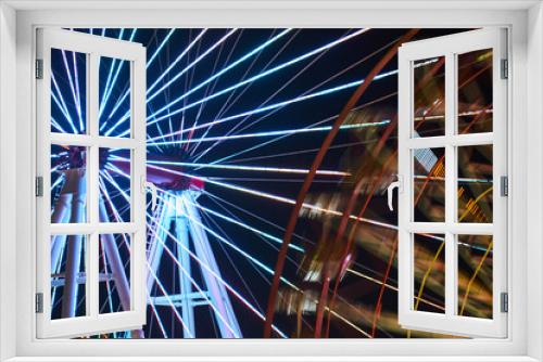 Fototapeta Naklejka Na Ścianę Okno 3D - night lights and ferris wheel in amusement park
