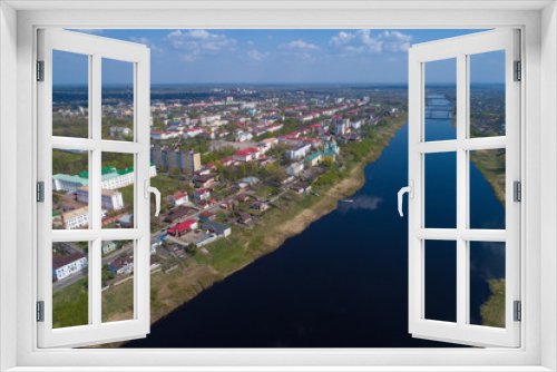 Fototapeta Naklejka Na Ścianę Okno 3D - Top view of modern Polotsk and the Western Dvina on a sunny April day (aerial photography). Belarus