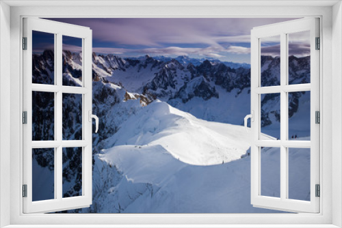Fototapeta Naklejka Na Ścianę Okno 3D - View from Aiguille du Midi, France. Skiers going down on Mer de Glace .