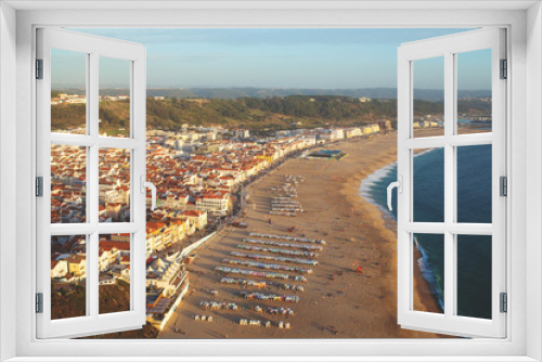 Fototapeta Naklejka Na Ścianę Okno 3D - Beautiful aerial view on town Nazare in Portugal. Sunset above coastline.