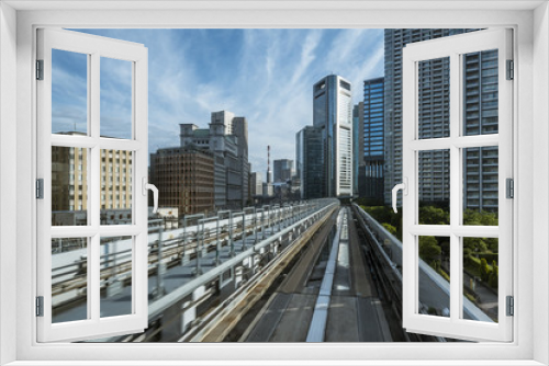 Cityscape from monorail sky train in Tokyo