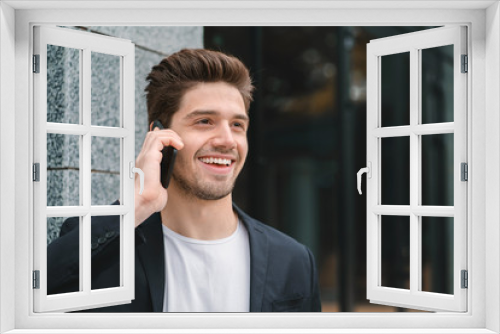 Close up portrait of businessman have conversation using mobile phone. Business guy in formal suit gladly talks with colleague. Office employee, wage worker, weekdays concept