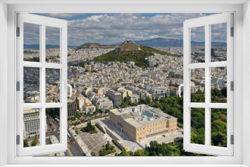 Fototapeta Naklejka Na Ścianę Okno 3D - Aerial photo of famous Greek Parliament building in Syntagma square and Lycabettus hill at the background with beautiful clouds and deep blue sky, Athens, Attica, Greece