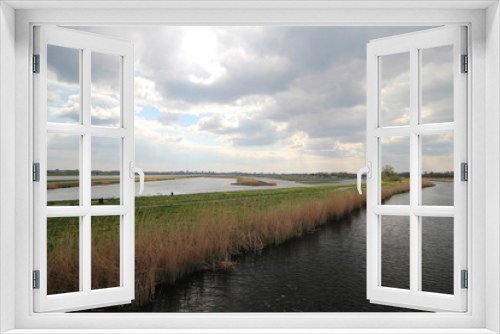 Fototapeta Naklejka Na Ścianę Okno 3D - Canal Hennipsloot in Zevenhuizen to connect the Rotte and the Zuidplaspolder ringvaart in the Netherlands
