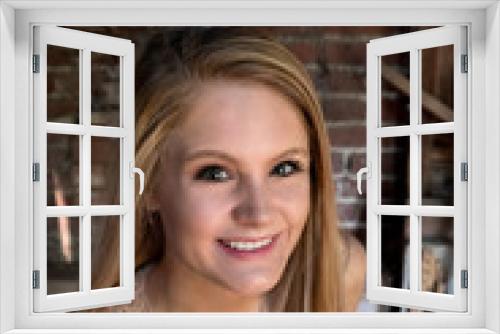 Blonde Teenage Girl against an Old Wall