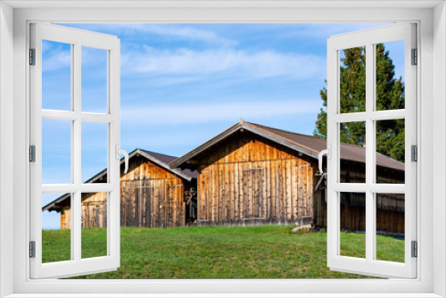 Fototapeta Naklejka Na Ścianę Okno 3D - Cabins in a pasture in Austrian alps at Serfaus (Tyrol)