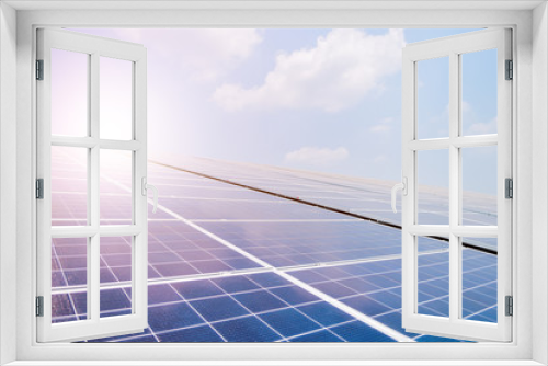 Fototapeta Naklejka Na Ścianę Okno 3D - Solar cell in solar farm with green tree and sun lighting reflect, Alternative energy and sustainable energy, photovoltaic, Pure energy Concept.