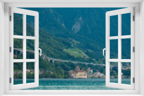 Fototapeta Naklejka Na Ścianę Okno 3D - Chillon Castle. mountains and viaduct highway construction on the shores of Lake Geneva (Lac Leman) in Montreux Riviera, Vaud, Switzerland