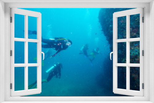 Fototapeta Naklejka Na Ścianę Okno 3D - Divers and coral reef