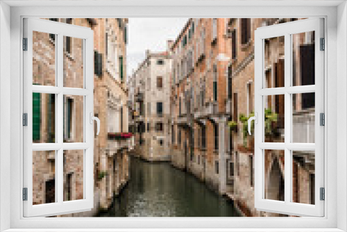 Fototapeta Naklejka Na Ścianę Okno 3D - The dark waters of The Venetian canal