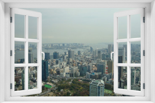 Fototapeta Naklejka Na Ścianę Okno 3D - view to to tokyo city from the skyscraper