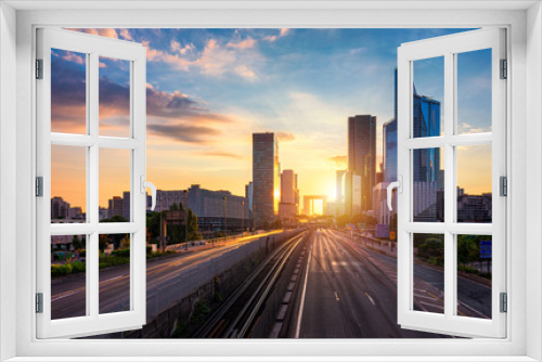 Fototapeta Naklejka Na Ścianę Okno 3D - La Defense Financial District Paris France at sunset. Skyscrapers of Defense modern business and financial district in Paris with high-rise buildings and convention center. La Defense business area.