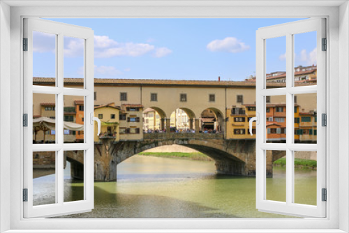 Fototapeta Naklejka Na Ścianę Okno 3D - Ponte Vecchio in Florence, Italy. Ancient Bridge over the Arno River in one of Tuscany's biggest Tourist Attractions
