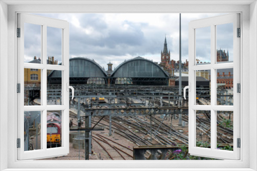 Fototapeta Naklejka Na Ścianę Okno 3D - Trains leaving London's Kings Cross St. Pancras Station