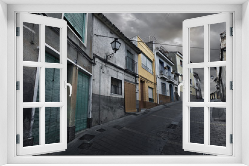 Fototapeta Naklejka Na Ścianę Okno 3D - Calle de pueblo