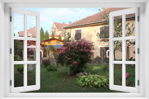 Fototapeta Naklejka Na Ścianę Okno 3D - The house with the garden