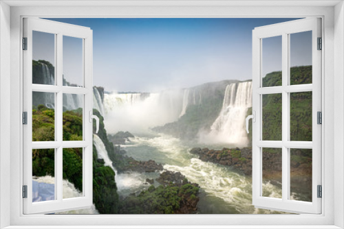 Fototapeta Naklejka Na Ścianę Okno 3D - Iguazu Falls, a magnificent waterfall located In Brazil and Argentina