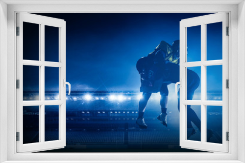 Fototapeta Naklejka Na Ścianę Okno 3D - American football players on stadium in action