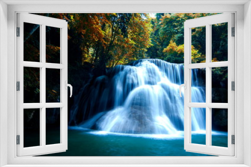 Fototapeta Naklejka Na Ścianę Okno 3D - Waterfall in the forest And colorful leaves, Famous tourist attractions of Thailand.