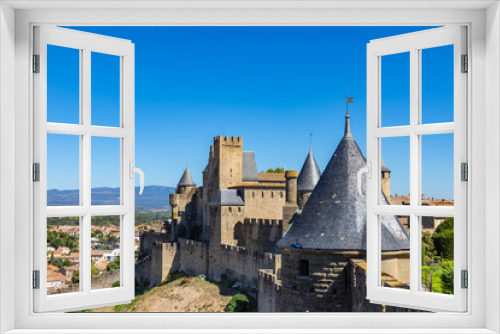 Fototapeta Naklejka Na Ścianę Okno 3D - The medieval fortress and walled city of Carcassone in southwest France. Founded by the Visigoths in the 5th century, it was restored in 1853 and is now a UNESCO World Heritage Site