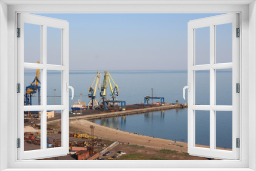 Fototapeta Naklejka Na Ścianę Okno 3D - Seaport with large industrial cranes.