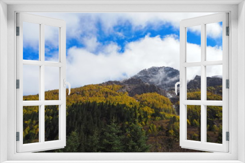 Fototapeta Naklejka Na Ścianę Okno 3D - Beautiful Blue sky and high mountains with colorful leaves and tress in autumn season for landscape view and natural concept