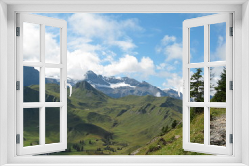 Fototapeta Naklejka Na Ścianę Okno 3D - Blick auf Tal mit Bergen im Hintergrund- Adelboden, Berner Oberland - Schweiz