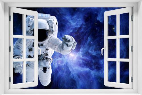Fototapeta Naklejka Na Ścianę Okno 3D - Alone Astronaut in outer space near the Sword of Orion. Science fiction wallpaper. Elements of this image were furnished by NASA