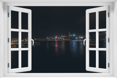 Fototapeta Naklejka Na Ścianę Okno 3D - Hong Kong cityscape at night. View From Victoria Harbour