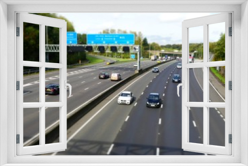 Fototapeta Naklejka Na Ścianę Okno 3D - Tilt shift photo of the M25 London Orbital Motorway near Junction 17 in Hertfordshire, UK