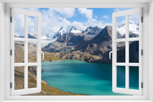 Fototapeta Naklejka Na Ścianę Okno 3D - Makestic and peaceful scenery of the mountains and blue lake
